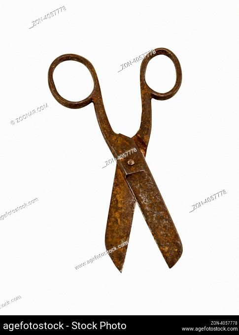 rusty old retro scissors isolated on white background