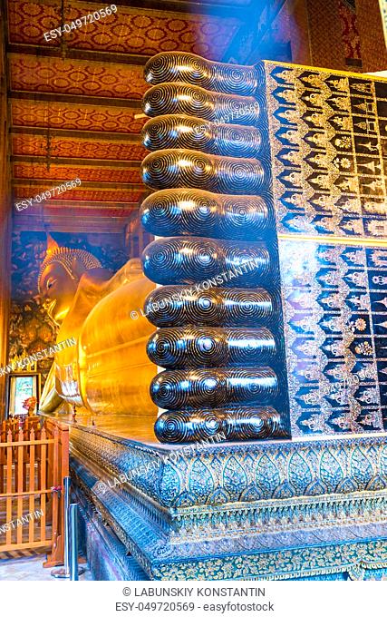 legs lying Buddha in a temple in Thailand, Bangkok
