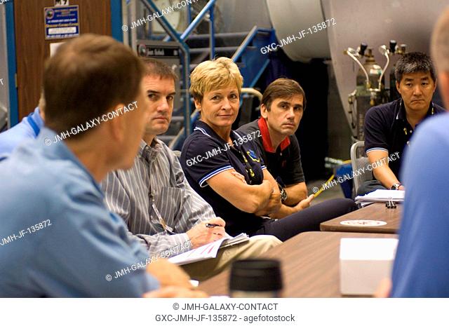 STS-122 and Expedition 16 crewmembers participate in a stationshuttle emergency scenario training session in the Space Vehicle Mockup Facility at the Johnson...