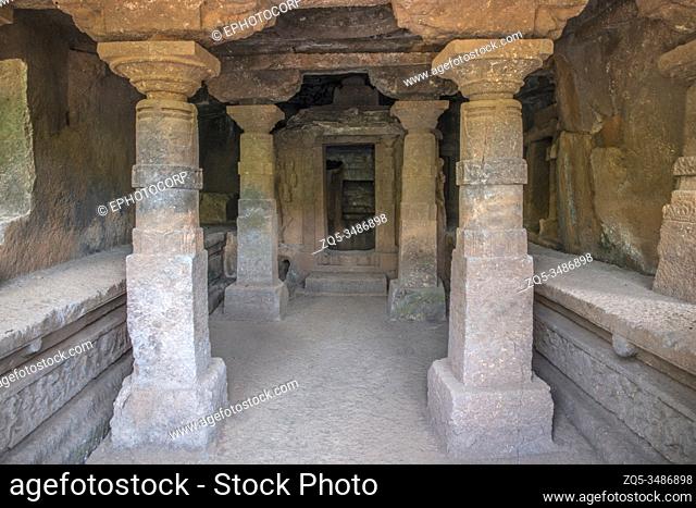 Panhale Kaji or Panhalakaji Caves, District- Sindhudurg, Maharashtra, India : Interior of sabha-mandapa showing pillars and view of garbhagriha of Cave No
