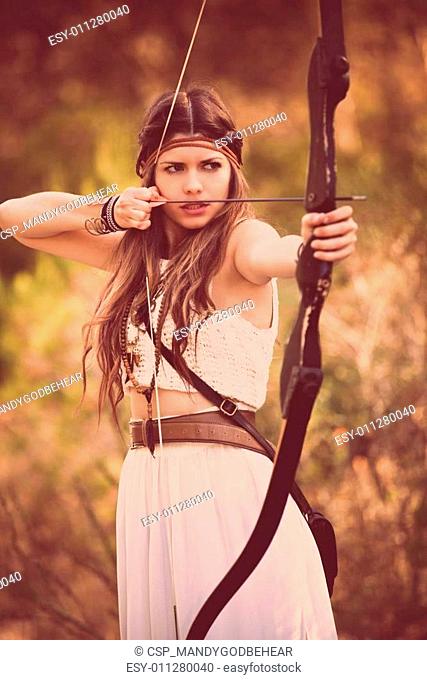 woodland hunter woman with bow and arrow