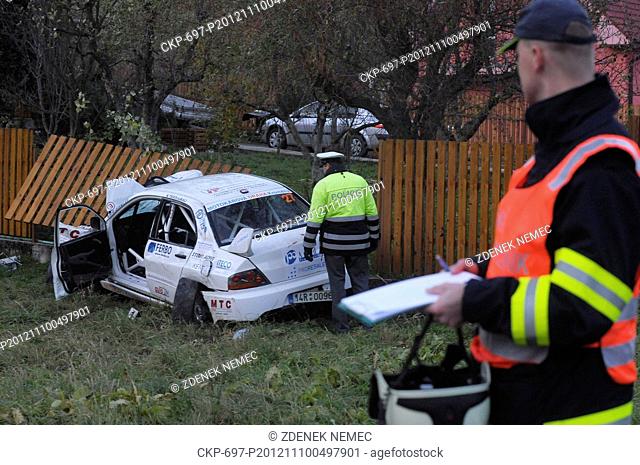 Policemen operate on the spot of an accident during the Czech RallyShow Uhersky Brod where a race car killed three young women and a 7-year-old girl after...