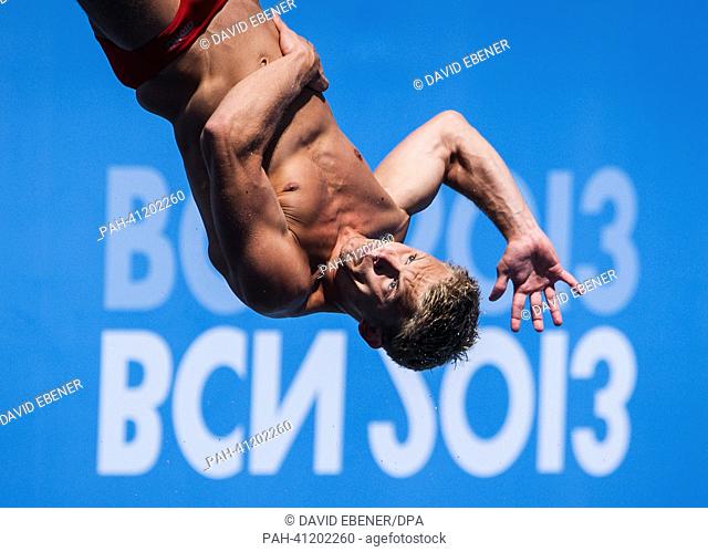 Oliver Homuth of Germany in action during the men's 1m Springboard diving final of the 15th FINA Swimming World Championships at Montjuic Municipal Pool in...