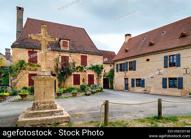 Street with historical houses in Saint-Leon-sur-Vezere, Dordogne, France