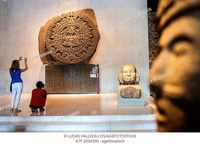 The Aztec Stone of the Sun and other artifacts on display at National Museum of Anthropology, Mexico City, Mexico