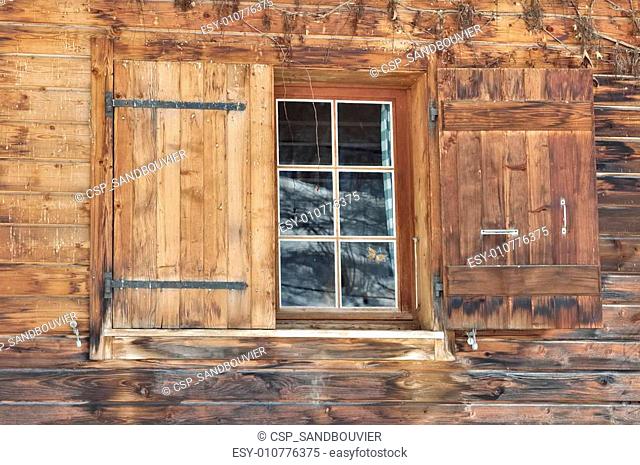 window on wooden facade