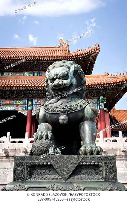 Bronze lion statue in front of Gate of Supreme Harmony in Forbidden City, Beijing, China