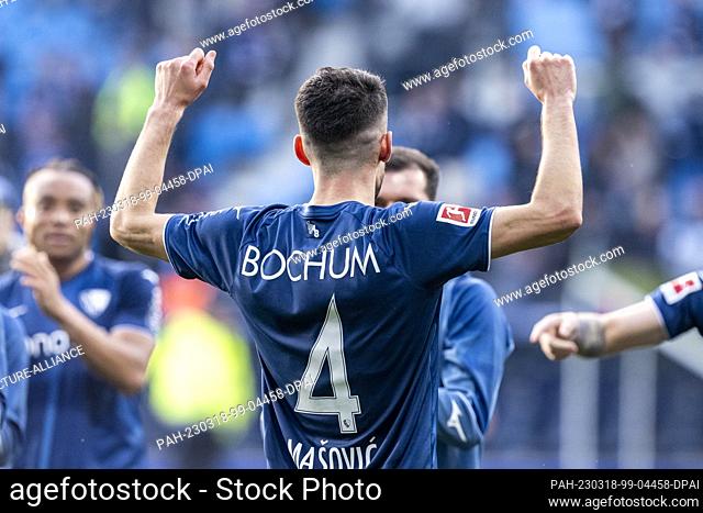 18 March 2023, North Rhine-Westphalia, Bochum: Soccer: Bundesliga, VfL Bochum - RB Leipzig, Matchday 25, Vonovia Ruhrstadion: Bochum's Erhan Masovic cheers...