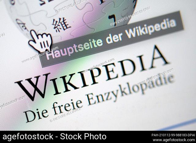 ILLUSTRATION - 11 January 2021, Baden-Wuerttemberg, Stuttgart: Under a cursor, the home page with the logo of the German-language Internet encyclopedia...
