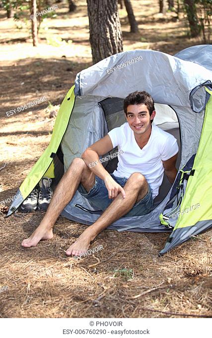 Young man camping