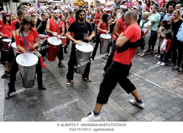 Batucada. The percussion group Samba da rua performing in the streets of Llanes during the festival of San Roque 2011