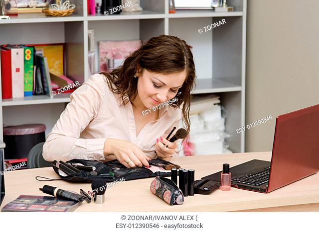 Girl in the office goes through brush beautician