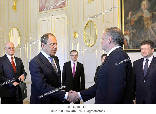 Slovak President Andrej Kiska, right, welcomes Russian Foreign Minister Sergey Lavrov prior to their meeting in Bratislava, on Saturday, April 4, 2015