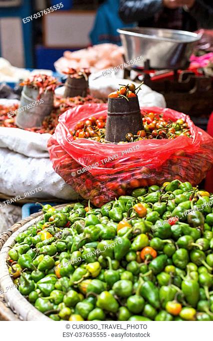 The street vendor sels his fruits and vegetables in Thamel in Kathmandu, Nepal