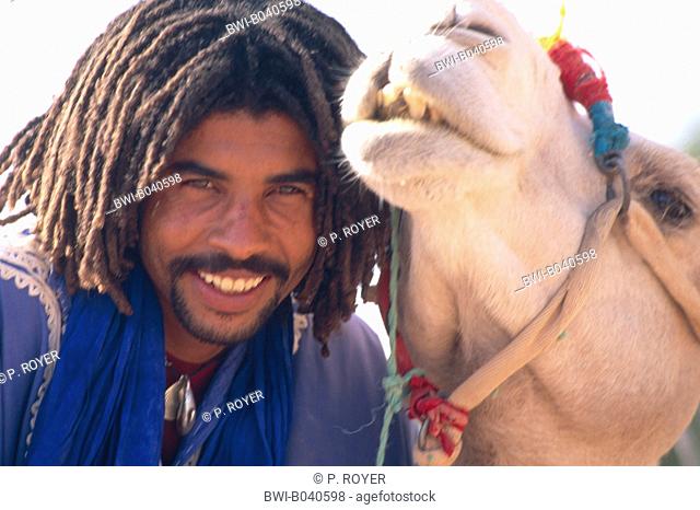 Moroccan bedouin in Dades Valley, double portrait with camel, Morocco, Suedmarokko, Dades Valley