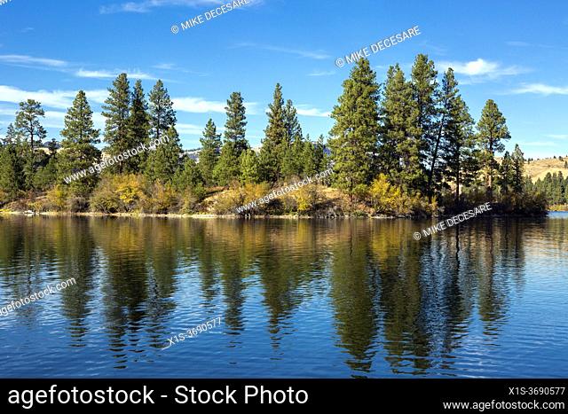 Curlew LAke near Republic, Washington, is a glacier carved lake that today attracts anglers, boaters and water sports enthusiasts/