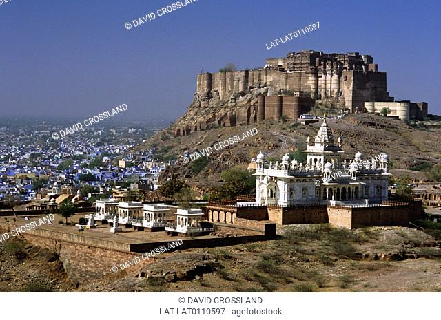 Meherangarh fort stands at 400 feet above the city on a rocky outcrop with the city seen below. The white marble Jaswant Thada cenotaph in front
