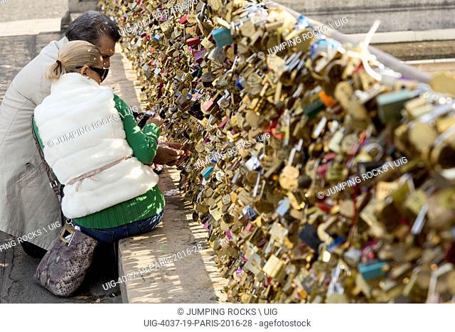 love locks on Pont de L'Archeveche, Paris, France