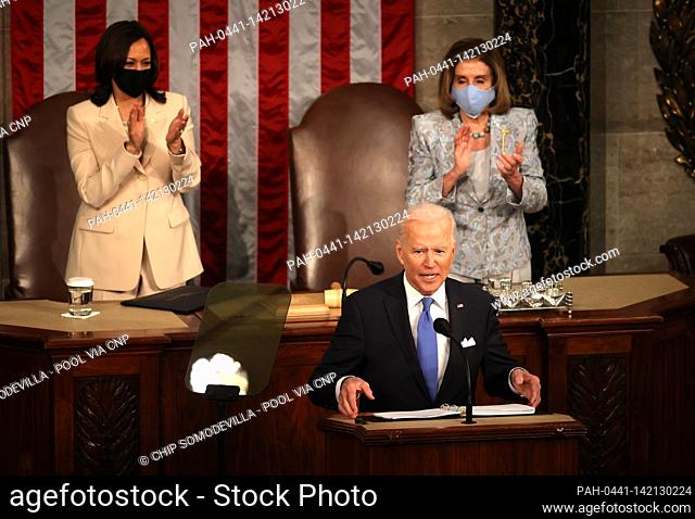 WASHINGTON, DC - APRIL 28: U.S. President Joe Biden addresses a joint session of congress as Vice President Kamala Harris (L) and Speaker of the House U