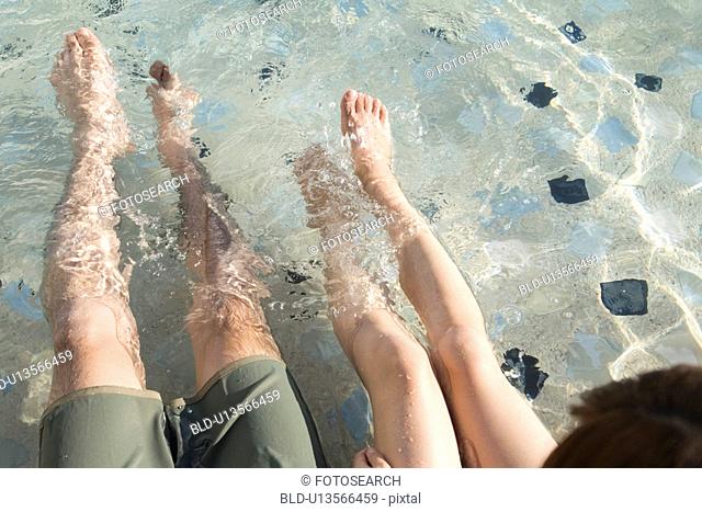 Legs in a swimming pool, Saipan