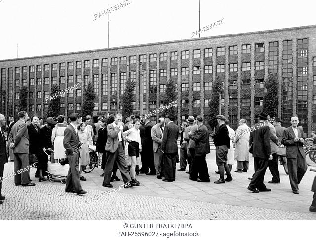 A group of onlookers gathers on the 3rd of June in 1952 in front of the House of Broadcasting in Berlin, which is blocked by the British Army
