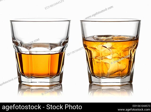 Glass of whisky and ice isolated white background