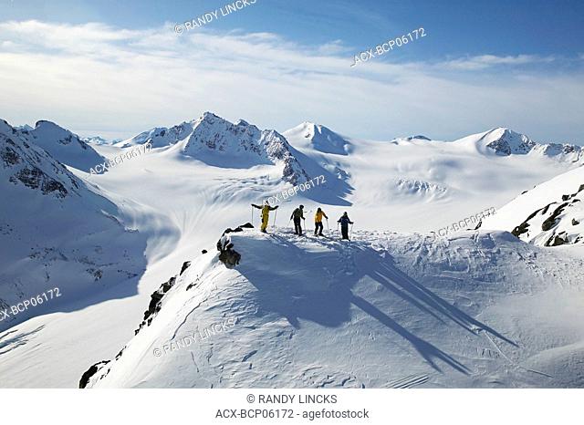 Skiers ready to take a run in the back country of whistler blackcomb, British Columbia, Canada