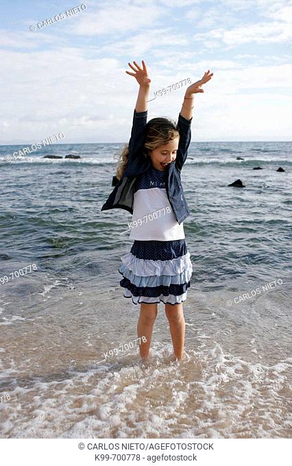 Girl on the beach, Tarifa. Cadiz province, Andalusia, Spain