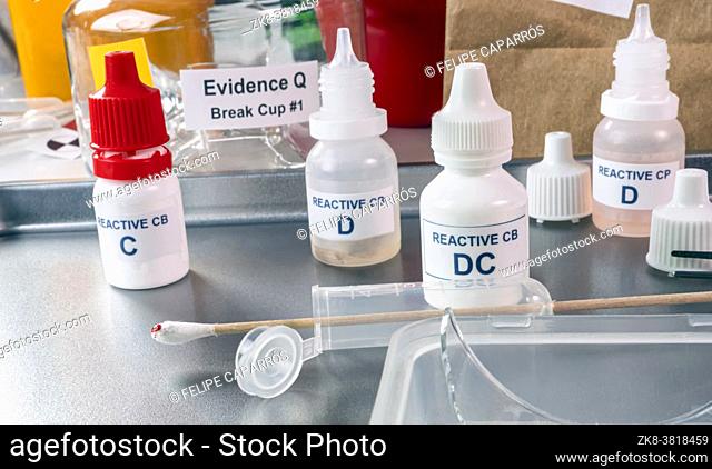 samples from a broken glass bottle in Criminalistic Lab, conceptual image