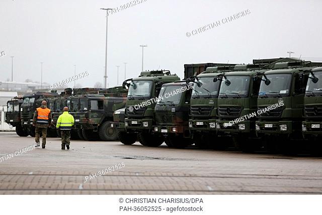 Vehicles and containers with 'Patriot' defence missiles are loaded for the mission in Turkey in the harbor of Luebeck-Travemuende in Travemuende, Germany