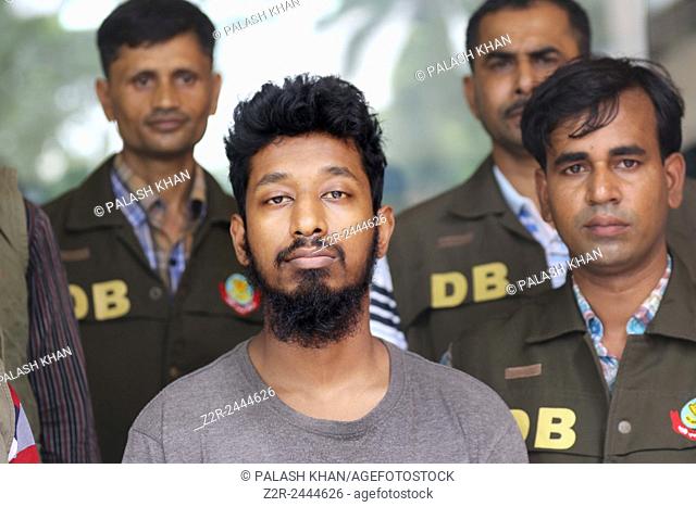 Dhaka 31 May 2015. Detectives produce the suspected local IS recruiter Abdullah Al Ghalib (c) at media centre of Dhaka Metropolitan Police