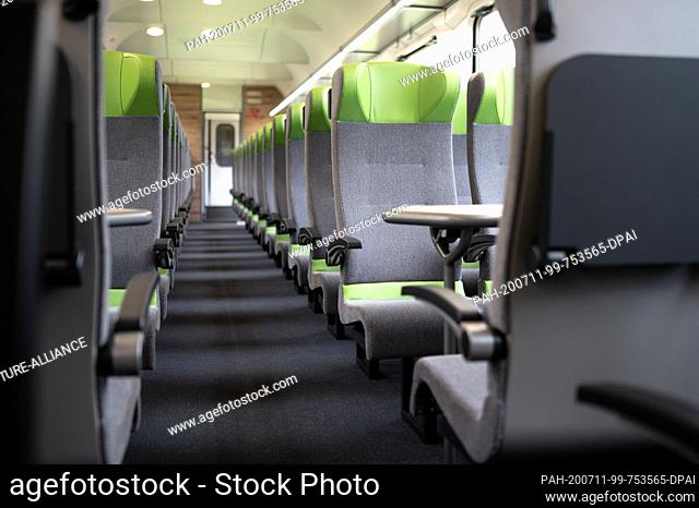 10 July 2020, North Rhine-Westphalia, Aachen: A large capacity car from the company Flixtrain. The cars of the Flixbus sister company were renovated during the...