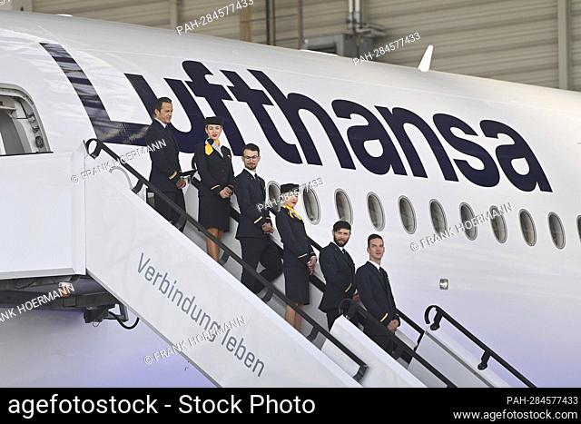 Flight attendants, stewardess, steward, cabin crew stand on the gangway, Lufthansa aircraft christening Airbus A350 MUENCHEN on April 29th