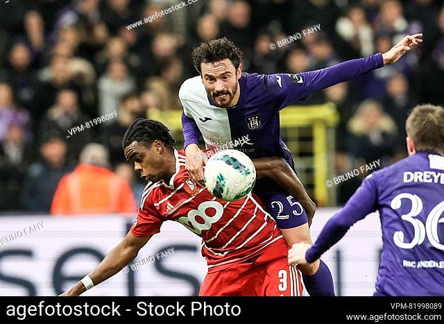 Standard's Nathan Ngoy and Anderlecht's Thomas Delaney fight for the ball during a soccer match between RSC Anderlecht and Standard de Liege