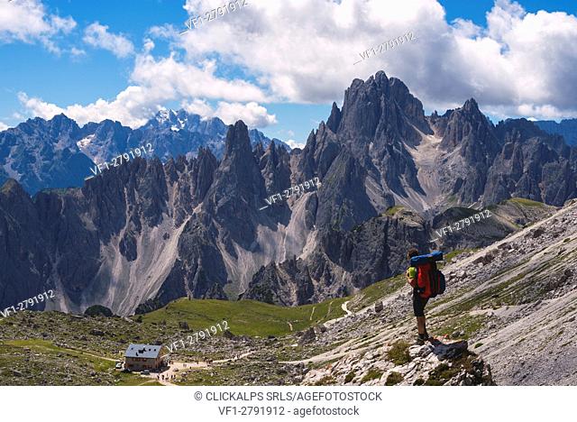 Hiker in dolomites, Belluno province, Veneto, Italy