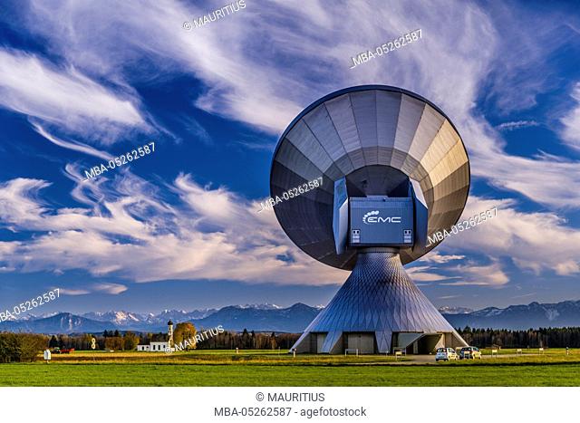 Germany, Bavaria, Upper Bavaria, Fünfseenland area, Ammersee region, Raisting, church St Johann, parabolic antennas of the earth station, EMC