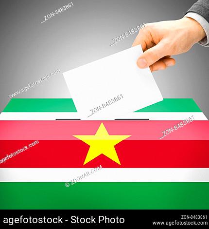 Voting concept - Ballot box painted into national flag colors - Suriname