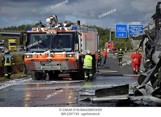 An airport fire engine helping to extinguish at a truck fire on the A8 motorway near the Echterdinger Ei junction, Stuttgart, Baden-Wuerttemberg, Germany
