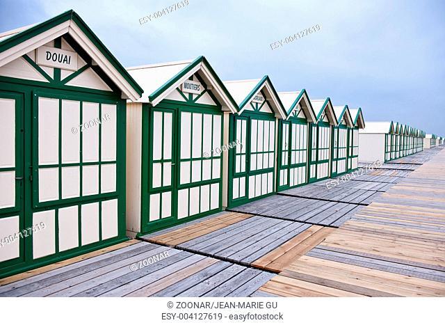 Wide angle view of wooden beach huts