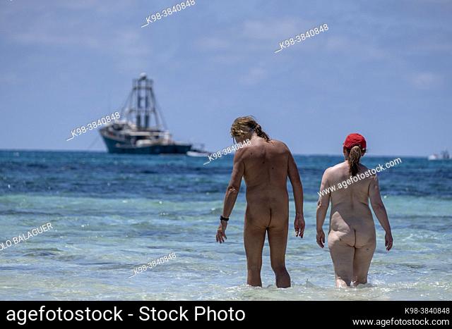 nudist couple bathing, Es Trenc beach, Campos municipality, Mallorca, Balearic Islands, Spain