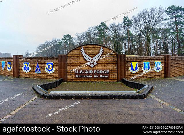 08 December 2023, Rhineland-Palatinate, Ramstein-Miesenbach: The symbol of the U.S. Air Force Ramstein Air Base and the symbols of various Air Force units