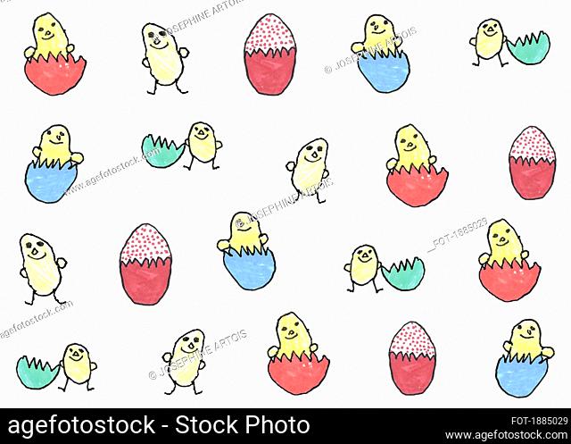 Childs drawing of chicks hatching from multi colored eggs