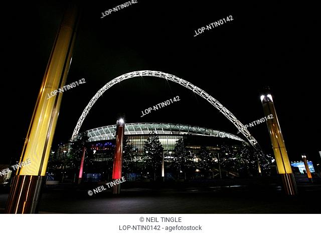 England, London, Wembley, View outside the new Wembley Stadium lit up at night