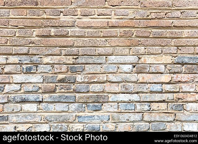 old brick wall background, blue brick and sand brick