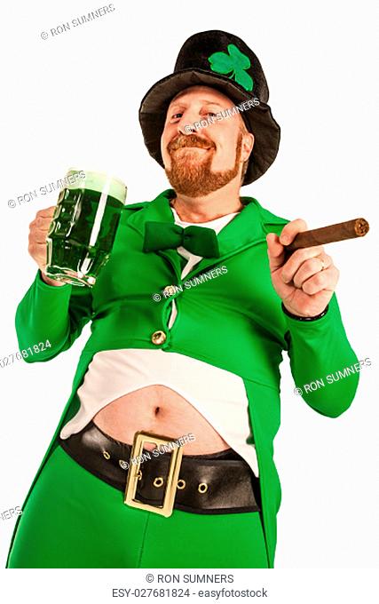 Photo of a man in a Leprechaun costume holding green beer and smoking a cigar