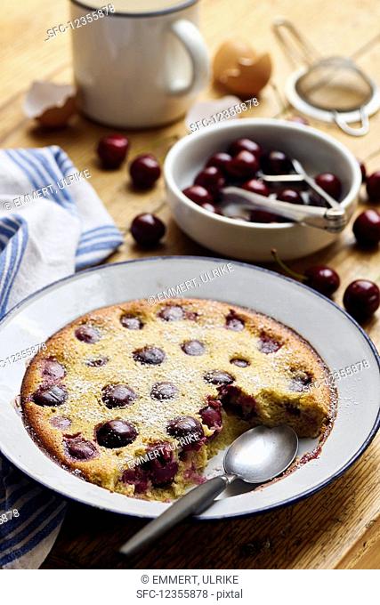 Cherry clafoutis on a rustic wooden table