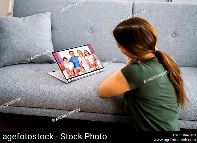 Woman Video Chatting And Talking On Laptop