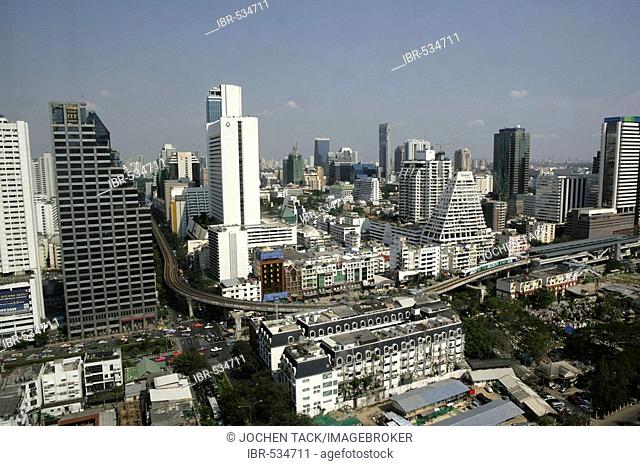 THA Thailand Bangkok Skyline at Silom Road Sky train track