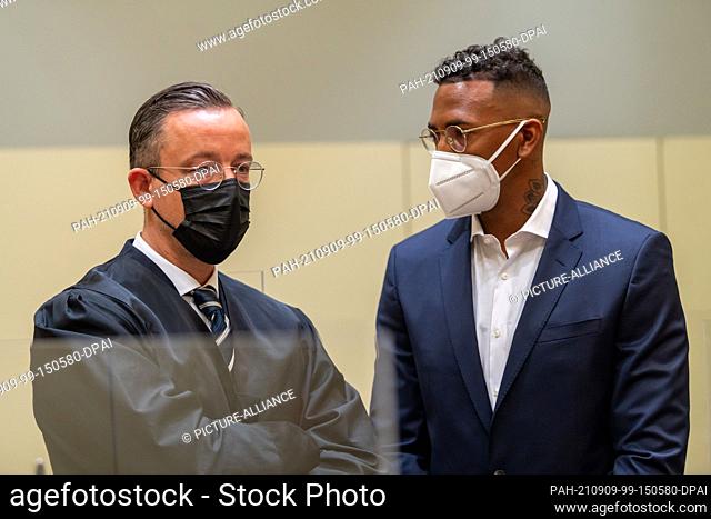 09 September 2021, Bavaria, Munich: Professional footballer and former national player Jerome Boateng (r) stands with his lawyer Kai Walden at the beginning of...