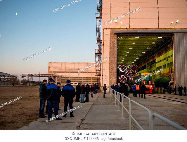 The moon is seen as the Soyuz rocket is prepared to be rolled out to the launch pad on Monday, April 17, 2017 at the Baikonur Cosmodrome in Kazakhstan